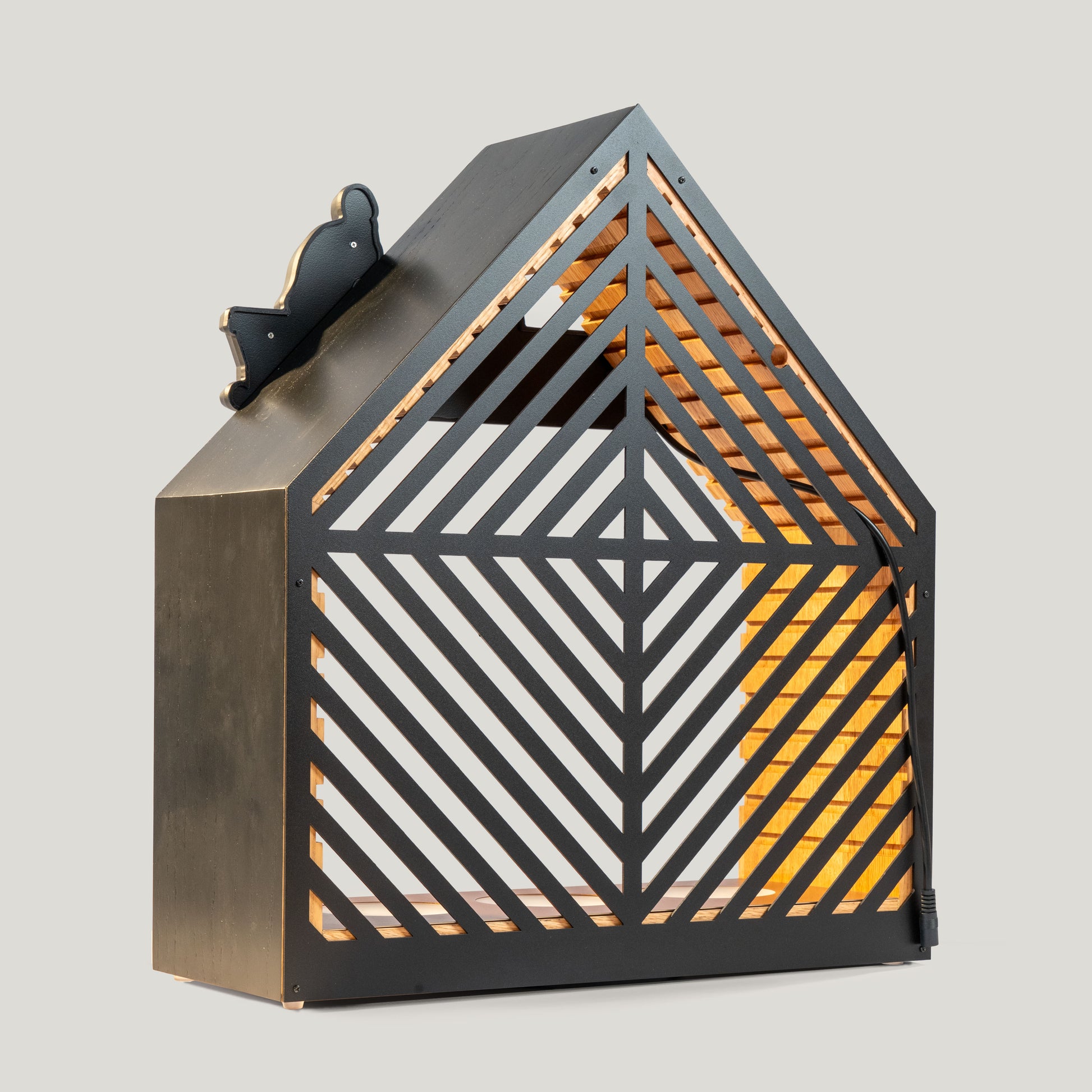 Back of decorative illuminated bottle glorifier on a gray background.